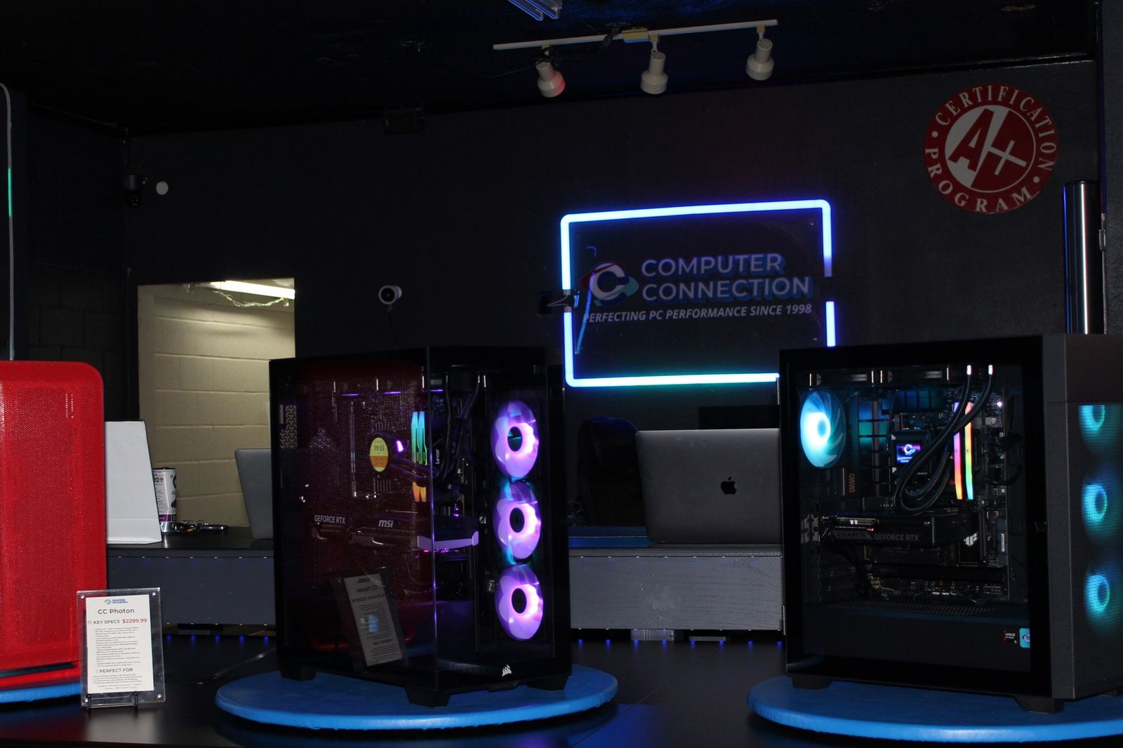 Inside Computer Connection on N May Ave: custom PCs on the showroom floor under our neon sign