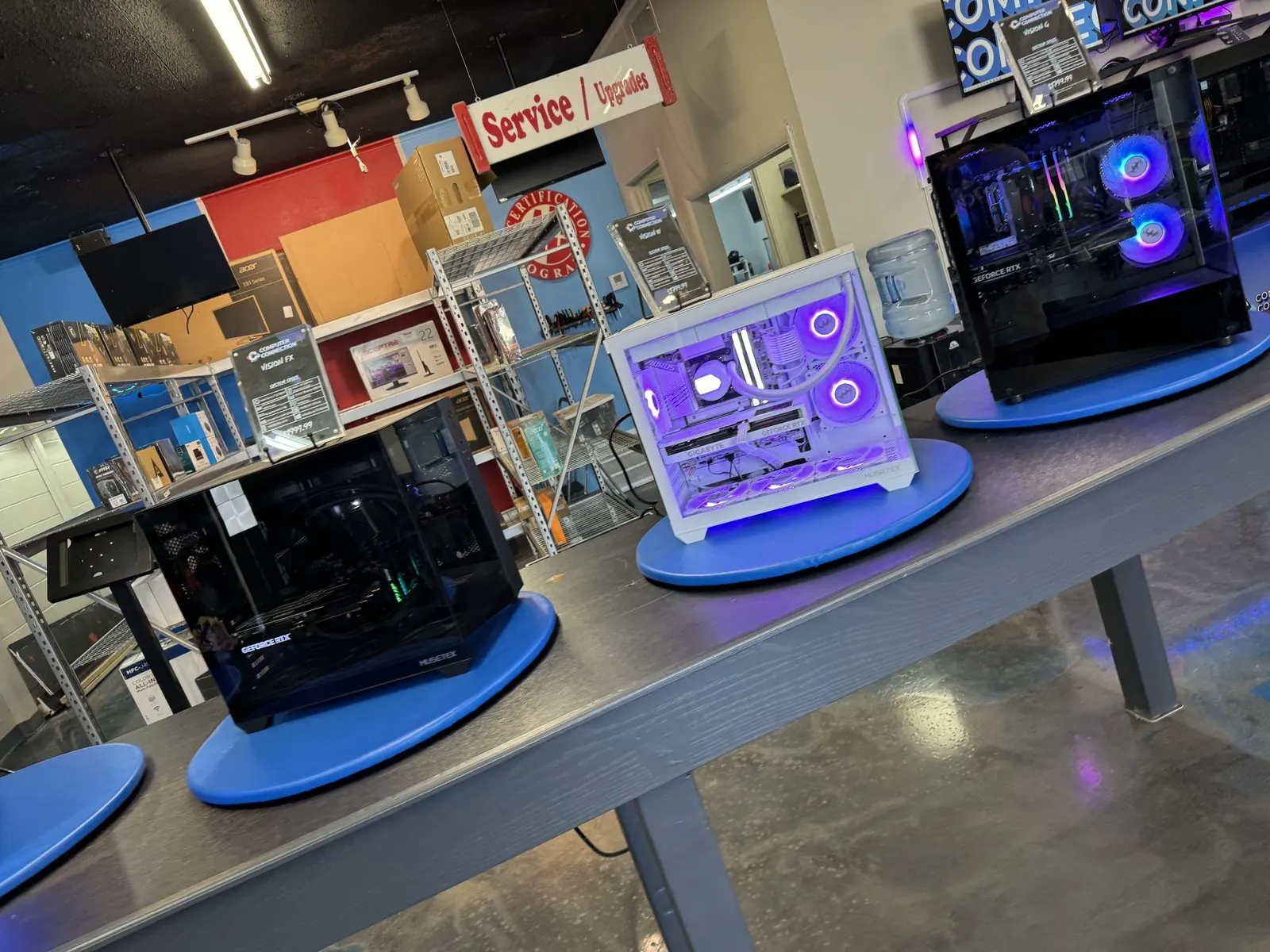 Custom PCs on display tables in the Computer Connection showroom