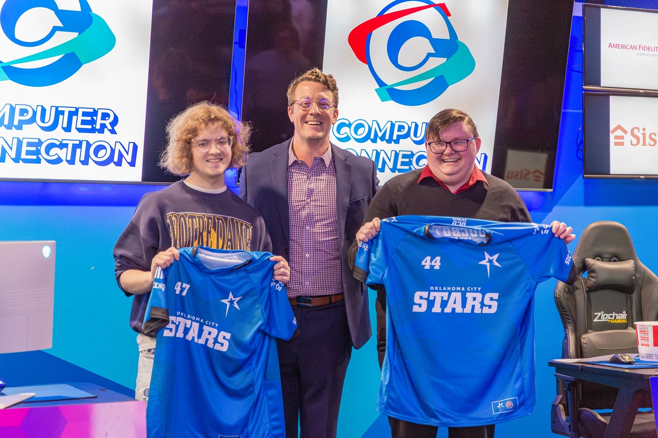 Computer Connection with local esports players holding Oklahoma City Stars jerseys